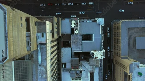 Birds-eye bustling city street reverse