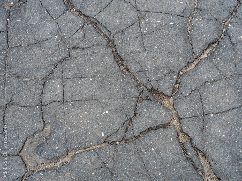 Obraz premium Old cracked asphalt