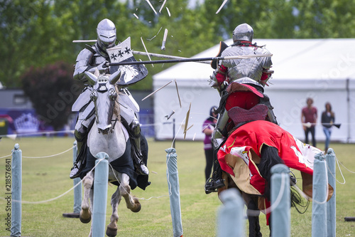 Two medieval knights confront during jousting tournament