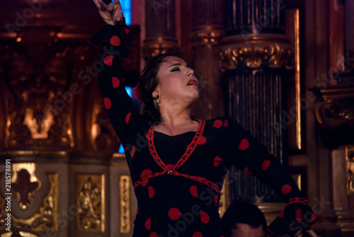 the beautiful girl, passionate and sweaty dancing flamenco