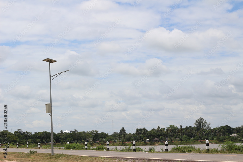 Fototapeta premium sport light post on white sky cloud background