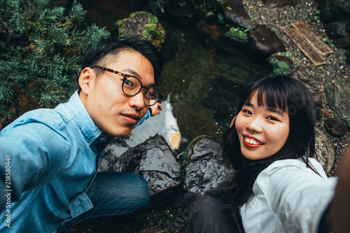 Photography Young japanese couple spending time in their house
