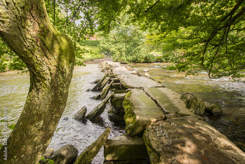 Dappled sunlight on the Tarr Steps Dappled sunlight on the Tarr Steps