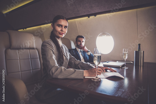 Business team on the private jet photo