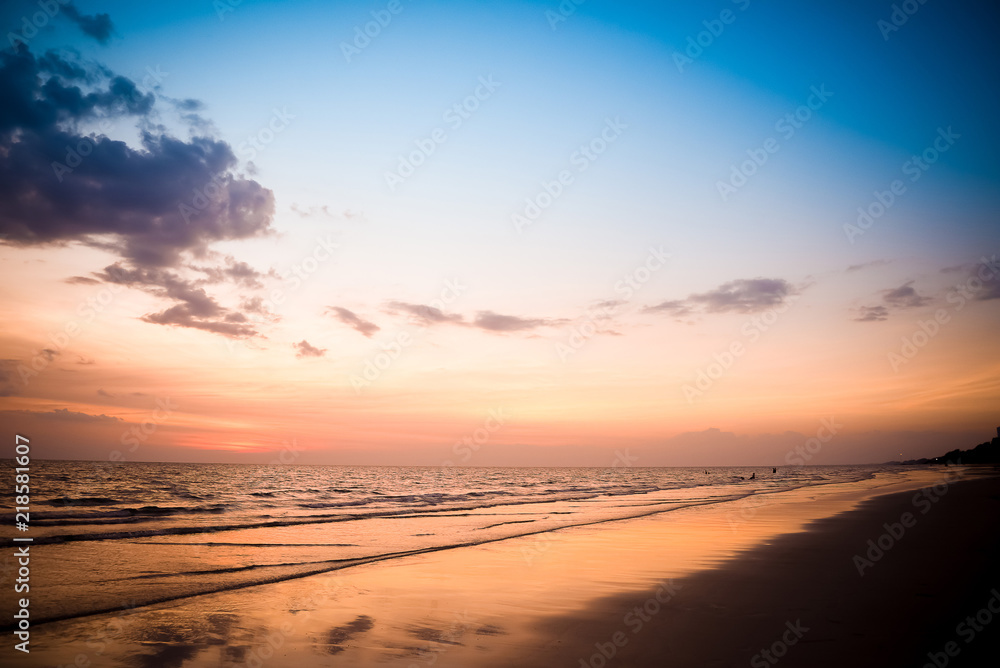 Nature in twilight period which including of sunrise over the sea and the nice beach. Summer beach with blue water and purple sky at the sunset. Nature in twilight period which including of sunrise over the sea and the nice beach. Summer beach with blue water and purple sky at the sunset.