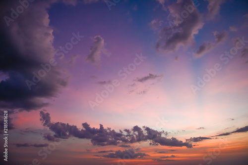 Nature in twilight period which including of sunrise over the sea and the nice beach. Summer beach with blue water and purple sky at the sunset.