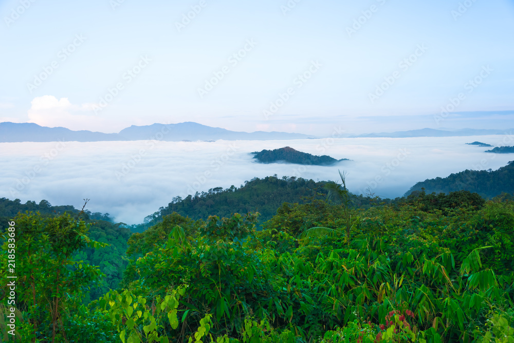 Scenic view of sunrise mountains at northeast Thailand, Mountain range for climbing in mountain trails. the landscape of mountain which including of copy-space for texting. - Vintage retro tone.