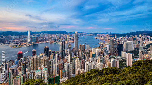 Aerial view of the Hong Kong city against sunset © FotoArtist