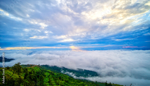 Over the Clouds. Fantastic background with clouds and mountain peaks