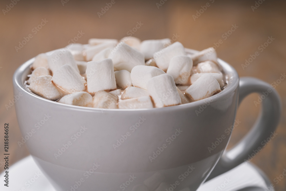 cup of cocoa drink with marshmallow on oak wood table cup of cocoa drink with marshmallow on oak wood table
