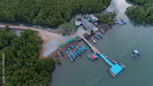 Longtail boats in the port at phang nga thailand Aerial view. photo