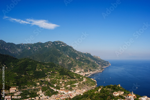 Small Italian villages in the covered with greenery mountains of Amalfi coast. Shot from Ravello on a sunny day 