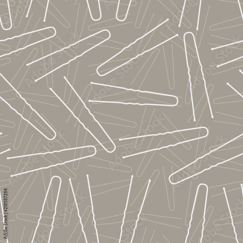 Hairpin. Fashionable vector background with hairpins. A seamless pattern with female accessories for the hairstyle.