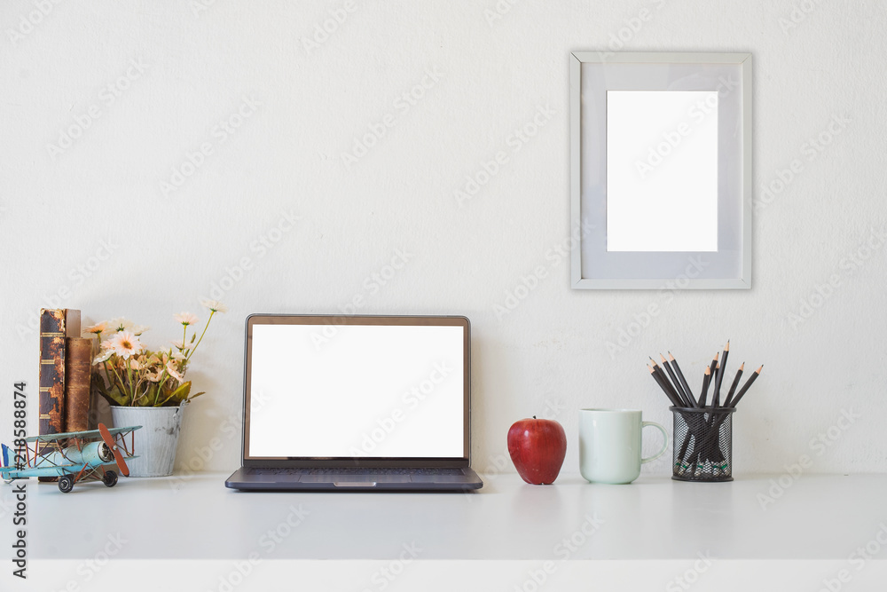 Obraz premium Workspace with modern desktop computer, office supplies flower plant at home or studio. Mock up.