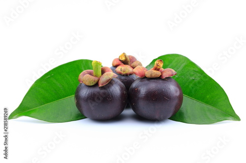 Fresh mangosteens on white background, isolated. Mangosteen, queen of fruits. Tropical fresh fruit.