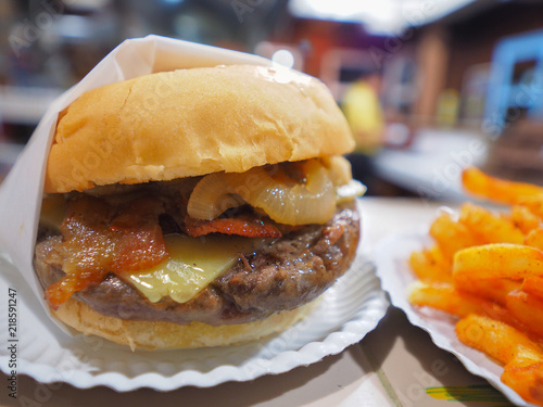  Medium rare wagyu meet  hamburger with onion  lectuce cheese bacon and photo