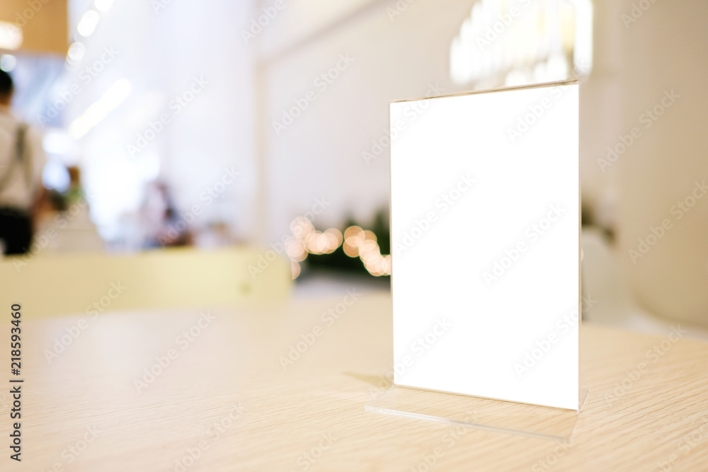 Menu frame standing on wood table in Bar restaurant cafe. space for text marketing promotion. Menu frame standing on wood table in Bar restaurant cafe. space for text marketing promotion.