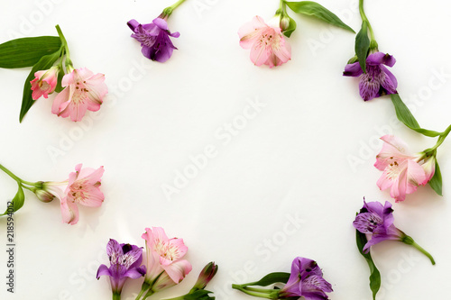 Floral background. Roses, eustoma, lilies on white background. Summer, spring background.