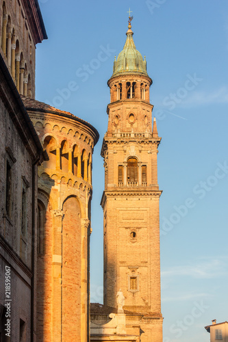 Side of Parma cathedral with bell tower of the church of San Giovanni in Parma, Italy