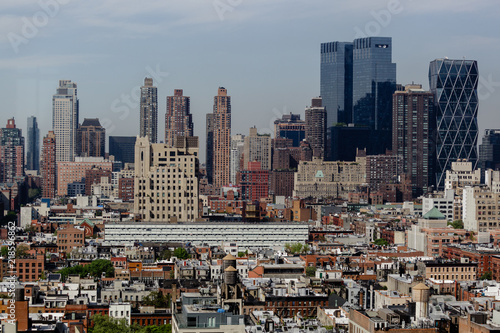 Skyline of hells kitchen in new york city during a summer day with blue sky © Katharina