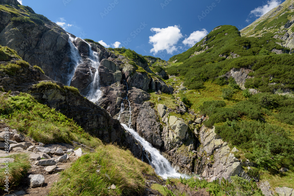 the Siklawa waterfall in the Tatra in summer,
