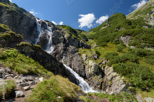 the Siklawa waterfall in the Tatra in summer,