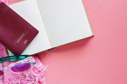Passport with opened notebo...