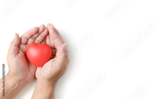 adult hands holding red heart isolated