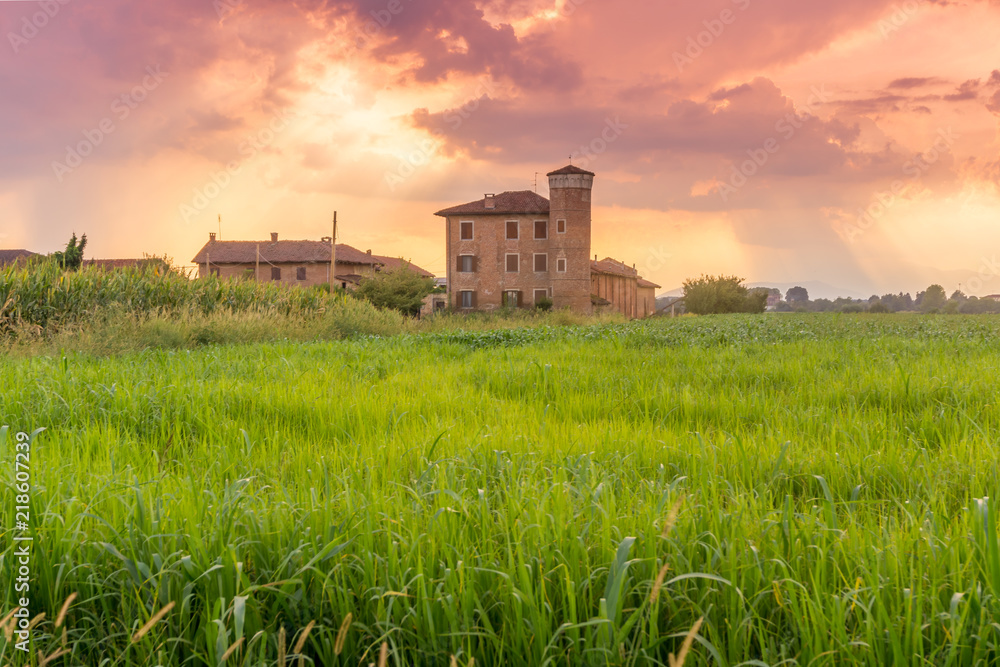 farmhouse in the countryside at sunset farmhouse in the countryside at sunset