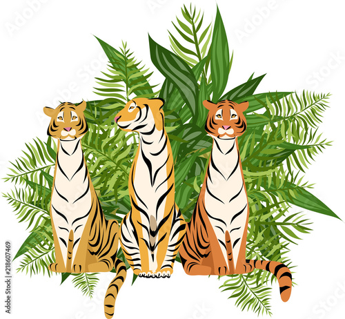 Fototapeta Naklejka Na Ścianę i Meble -  tigers on the background of tropical leaves