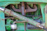 Close up view of an old engine of a tractor