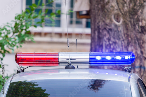 Red and blue signal lights on patrol police car or other emergency service photo