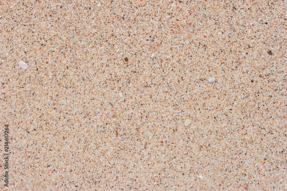 Sand and rock on beach. Summer beach background. Top view Sand and rock on beach. Summer beach background. Top view