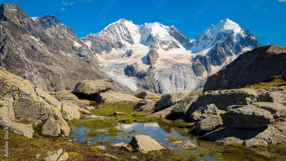 Fuorcla Surlej is one of the most beautiful places in Engadin. You can enjoy the view on the glaciers and Piz Roseg and Piz Bernina, it is simply breathtaking. Fuorcla Surlej is one of the most beautiful places in Engadin. You can enjoy the view on the glaciers and Piz Roseg and Piz Bernina, it is simply breathtaking.