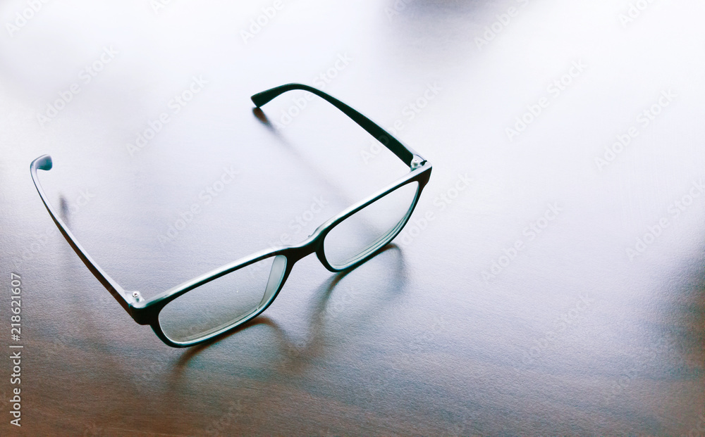 Modern style eyeglasses, spectacles or glasses on solid surface. Modern style eyeglasses, spectacles or glasses on solid surface.