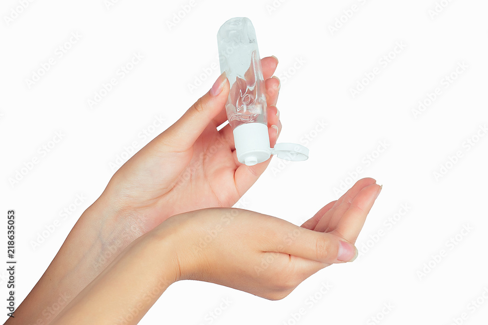 bottle with antibacterial antiseptic gel in hand on white isolate - obrazy, fototapety, plakaty 
