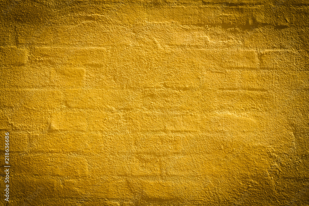 Naklejka premium Old Vintage yellow brick wall. Grunge Backgrounds.