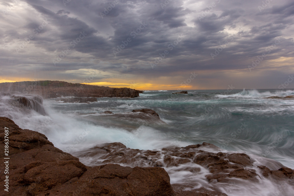 seascape Anna Bay beach in  morning with sunrise sky and dramatic strom cloud