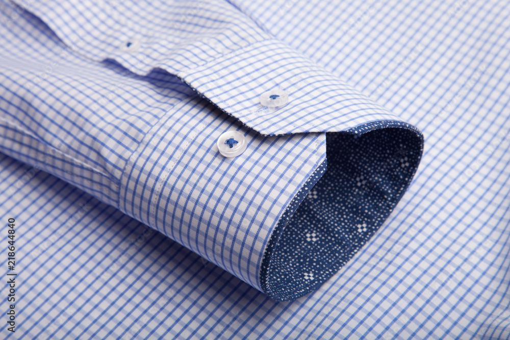 Piece of cotton shirt. Pure cotton fabric. Classic men's shirt collar detail Piece of cotton shirt. Pure cotton fabric. Classic men's shirt collar detail