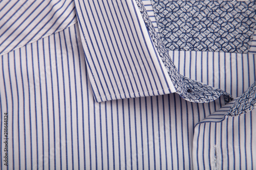 Piece of cotton shirt. Pure cotton fabric. Classic men's shirt collar detail 