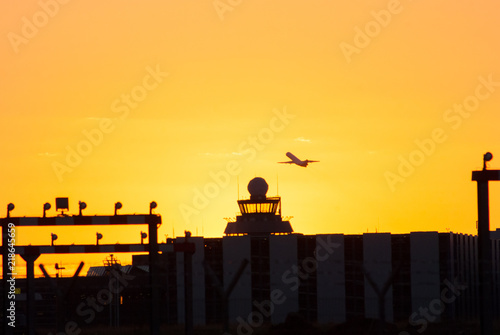 silhouette of plane leaving airport  © David