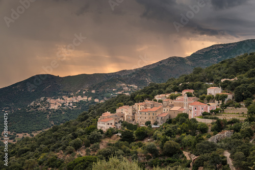 Stormy sunrise over village of Costa in Corsica