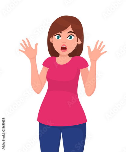 Young woman scared/feared/shocked/amazed face expression gesture hands.