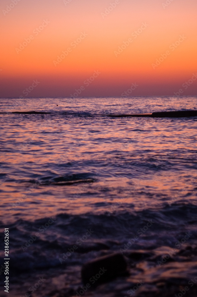 Amazing sea sunset, the sun, waves, clouds