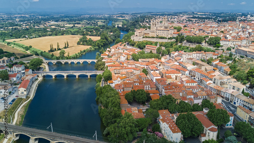 Aerial top view of Beziers town, river and bridges from above, South France
 photo