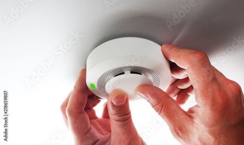 fire alarm and hand