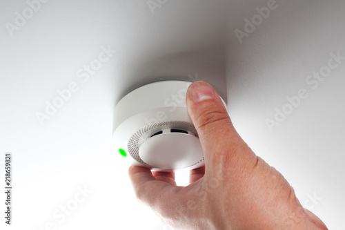 fire alarm and hand