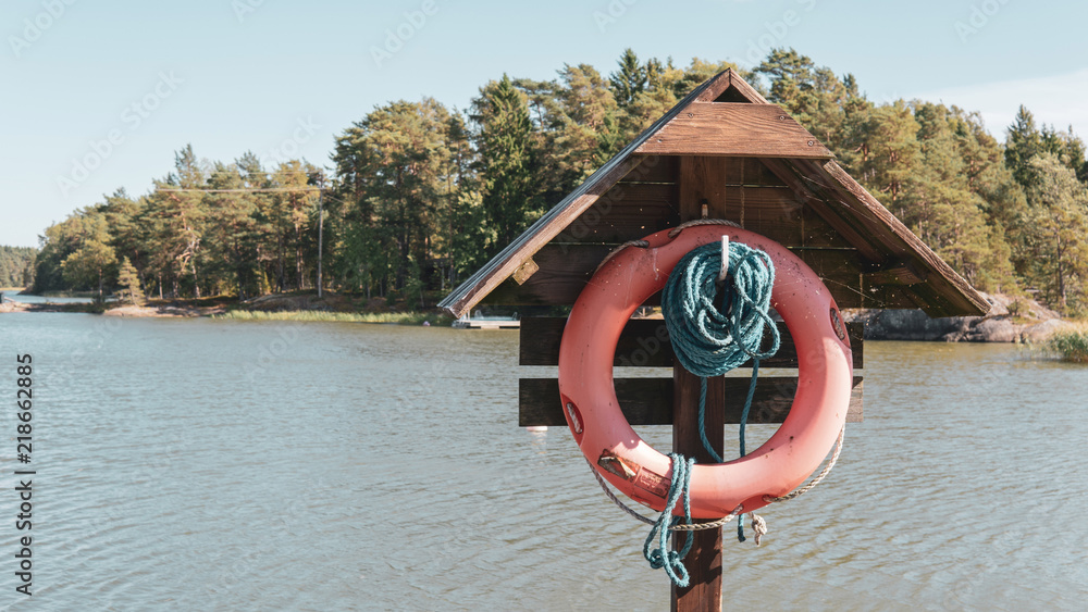 Obraz premium Lifebuoy on a pier.