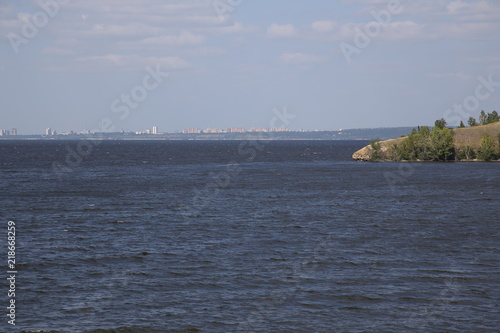 Panorama of the city from the bank of the river in summer. Russia.