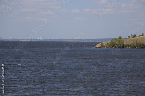 Panorama of the city from the bank of the river in summer. Russia.